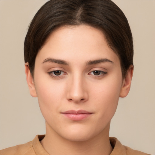 Neutral white young-adult female with short  brown hair and brown eyes