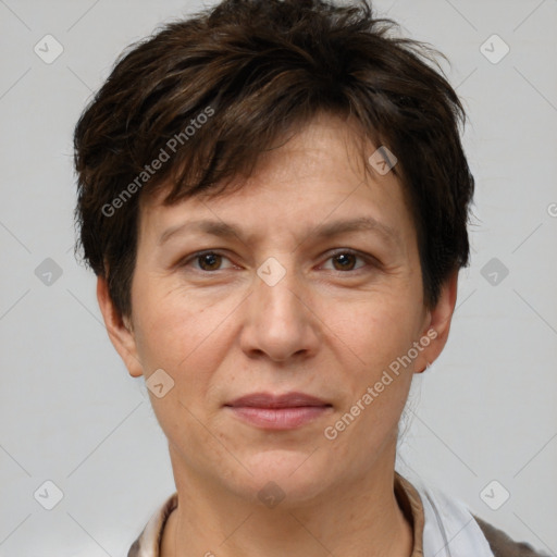 Joyful white adult female with short  brown hair and brown eyes