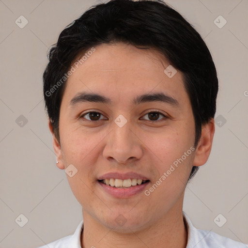 Joyful white young-adult male with short  black hair and brown eyes