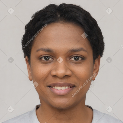 Joyful black young-adult female with short  black hair and brown eyes