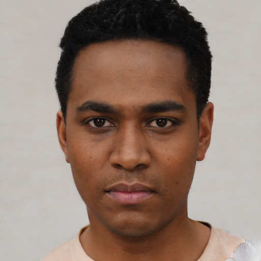Neutral black young-adult male with short  black hair and brown eyes