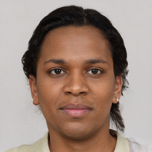 Neutral black young-adult female with short  brown hair and brown eyes