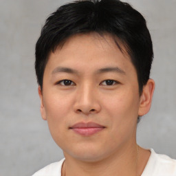 Neutral asian young-adult male with short  brown hair and brown eyes