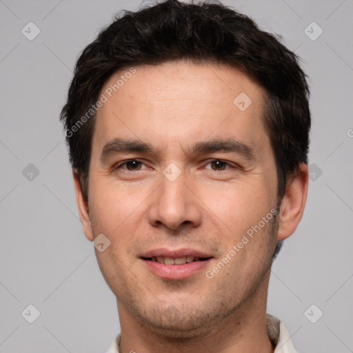 Joyful white adult male with short  brown hair and brown eyes