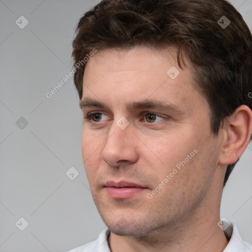 Neutral white young-adult male with short  brown hair and brown eyes