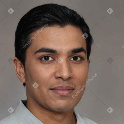 Joyful latino young-adult male with short  black hair and brown eyes