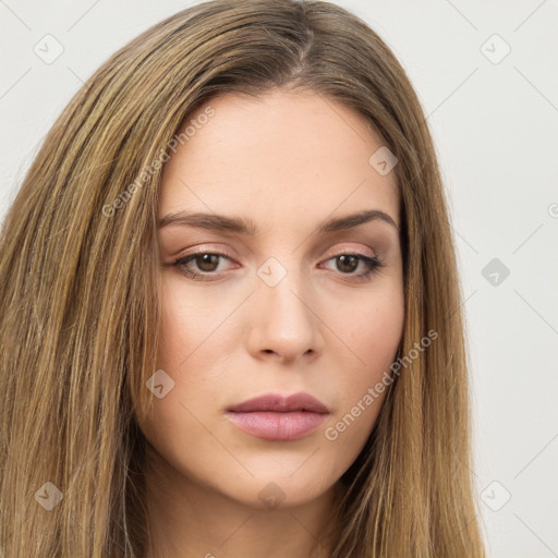 Neutral white young-adult female with long  brown hair and brown eyes