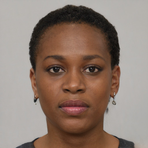 Neutral black young-adult female with short  black hair and brown eyes