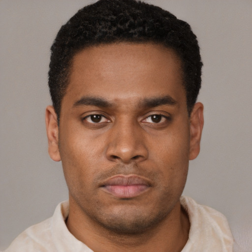 Neutral latino young-adult male with short  brown hair and brown eyes