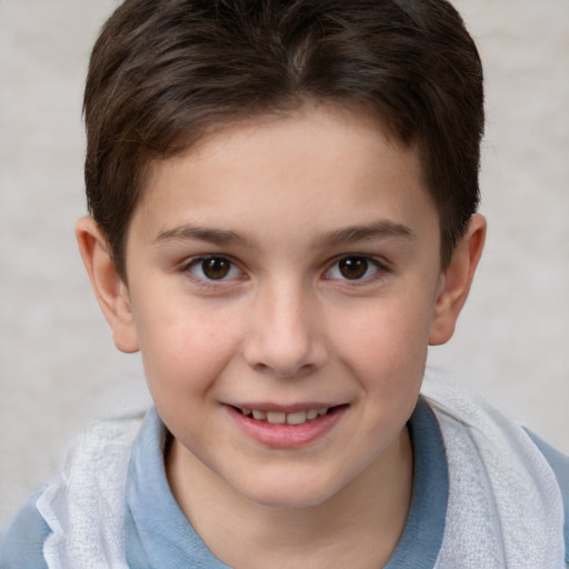 Joyful white child male with short  brown hair and brown eyes