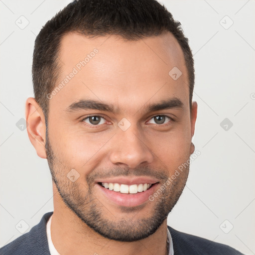 Joyful white young-adult male with short  brown hair and brown eyes