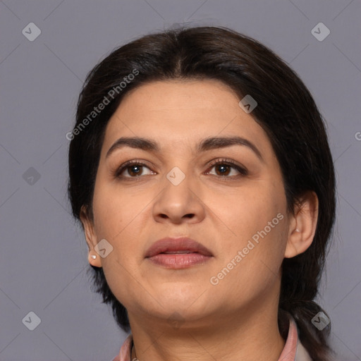 Joyful white young-adult female with medium  black hair and brown eyes