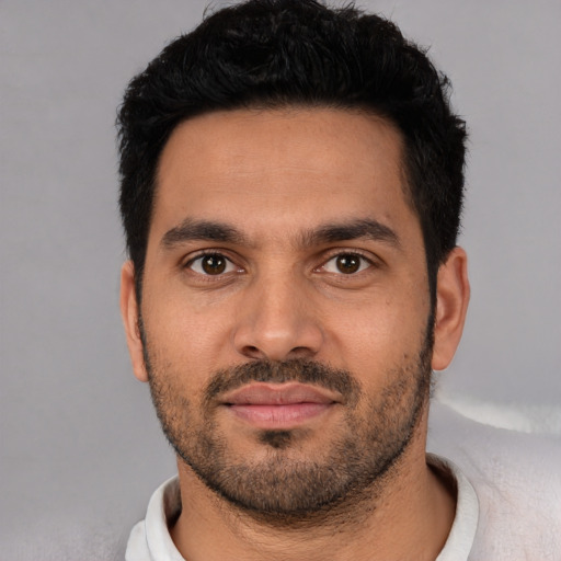 Neutral white young-adult male with short  black hair and brown eyes