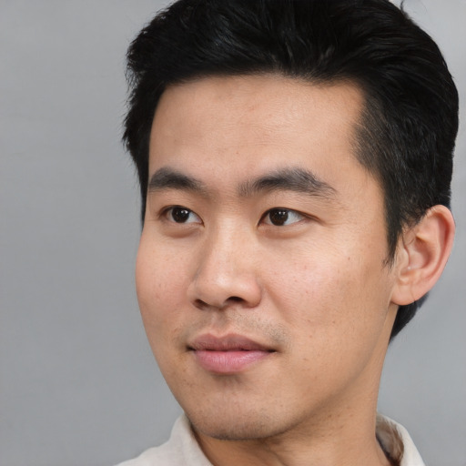 Neutral asian young-adult male with short  black hair and brown eyes