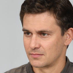 Neutral white adult male with short  brown hair and brown eyes