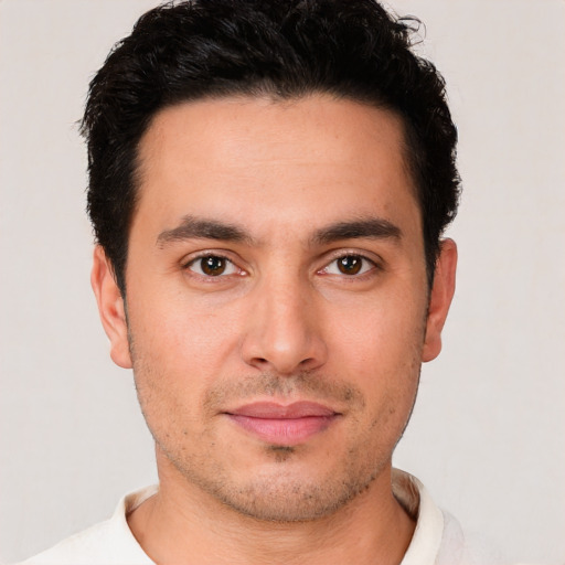 Neutral white young-adult male with short  black hair and brown eyes
