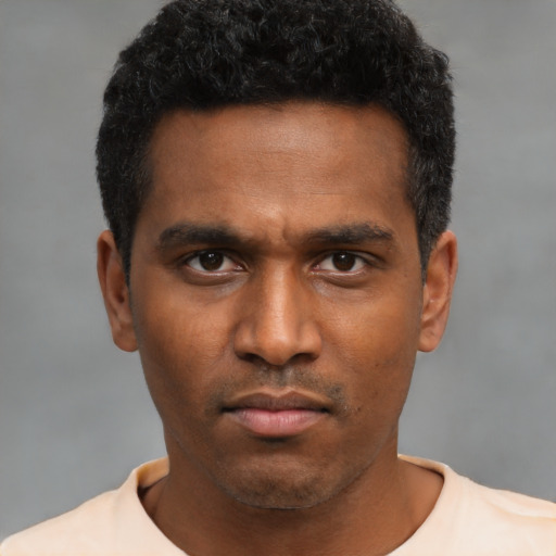 Neutral black young-adult male with short  black hair and brown eyes