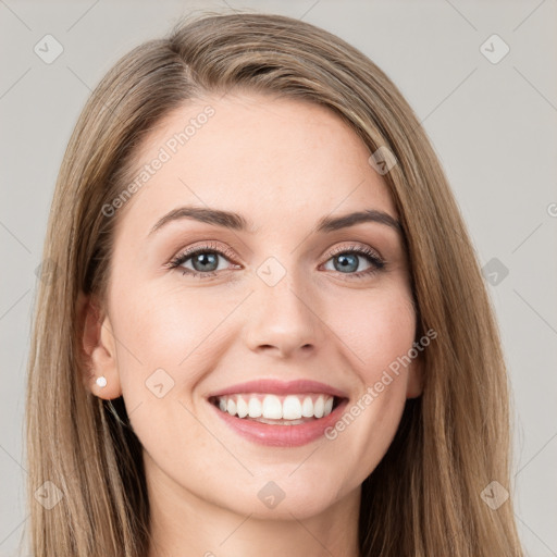 Joyful white young-adult female with long  brown hair and green eyes