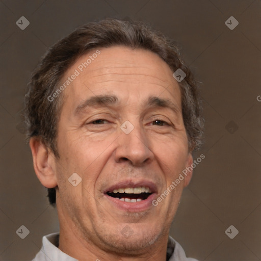 Joyful white middle-aged male with short  brown hair and brown eyes