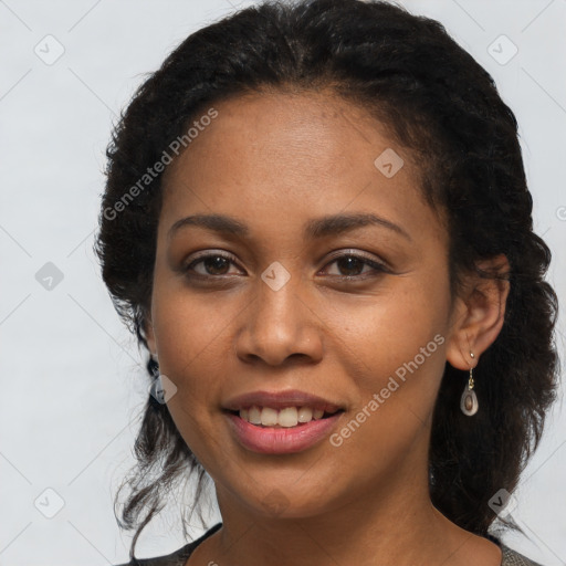 Joyful latino young-adult female with long  brown hair and brown eyes