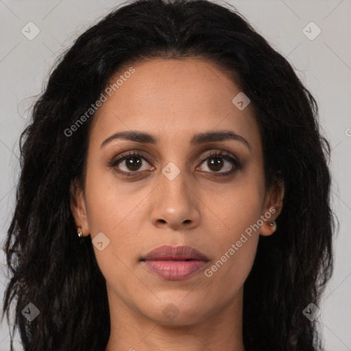 Joyful latino young-adult female with long  brown hair and brown eyes