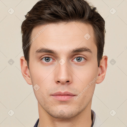 Neutral white young-adult male with short  brown hair and brown eyes