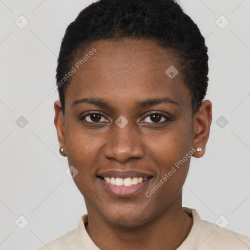 Joyful black young-adult female with short  black hair and brown eyes