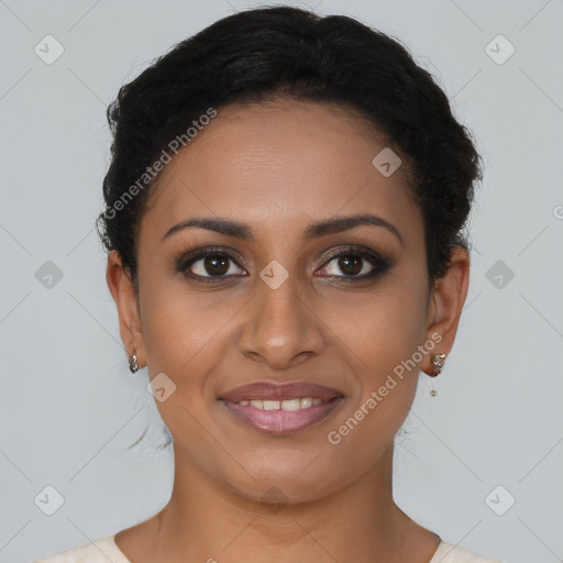 Joyful latino young-adult female with short  brown hair and brown eyes