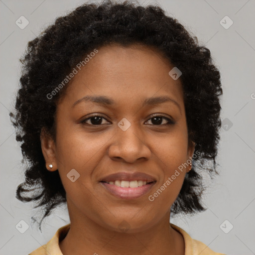 Joyful black young-adult female with medium  brown hair and brown eyes