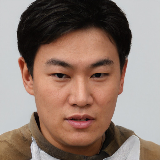 Neutral asian young-adult male with short  black hair and brown eyes