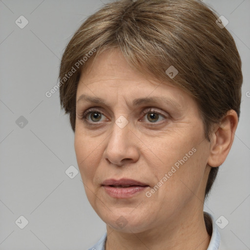 Joyful white adult female with short  brown hair and brown eyes