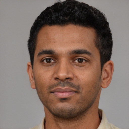 Neutral latino young-adult male with short  black hair and brown eyes