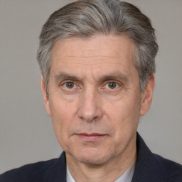 Neutral white middle-aged male with short  gray hair and brown eyes