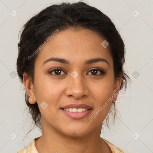 Joyful latino young-adult female with medium  brown hair and brown eyes