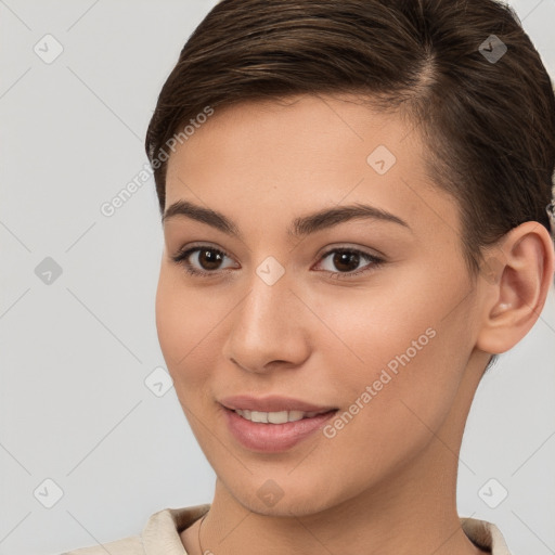 Joyful white young-adult female with short  brown hair and brown eyes