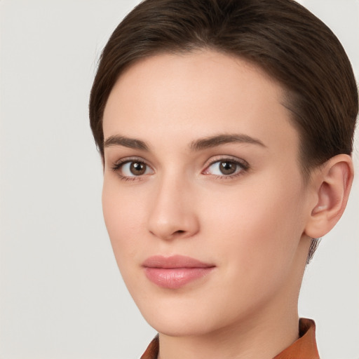 Neutral white young-adult female with short  brown hair and brown eyes