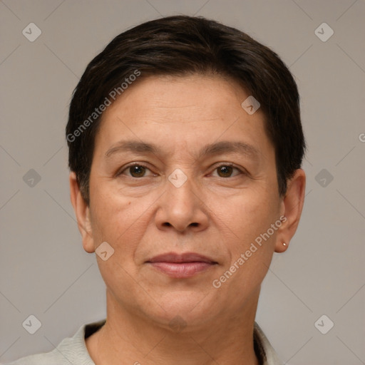 Joyful white adult female with short  brown hair and brown eyes