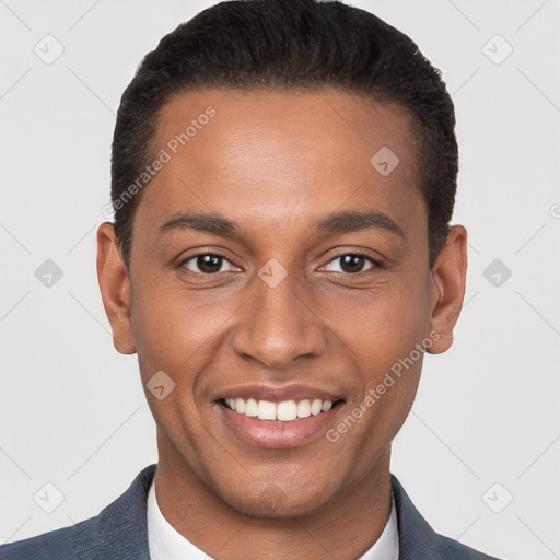 Joyful black young-adult male with short  black hair and brown eyes