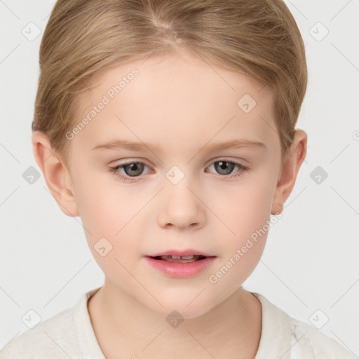 Joyful white child female with short  brown hair and grey eyes