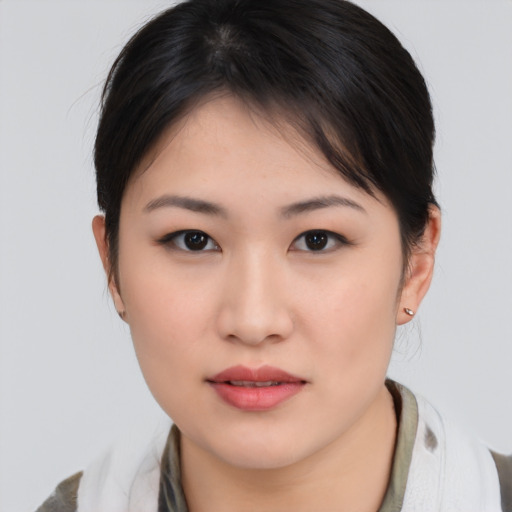 Neutral asian young-adult female with medium  brown hair and brown eyes