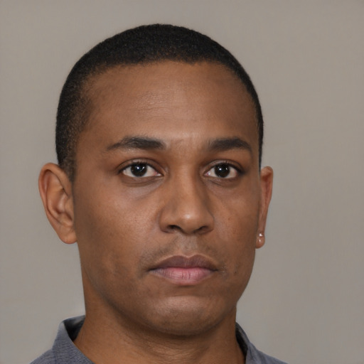 Neutral black young-adult male with short  brown hair and brown eyes