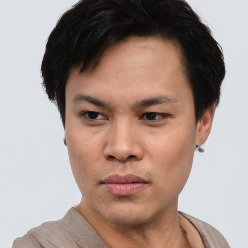 Neutral asian young-adult male with short  brown hair and brown eyes