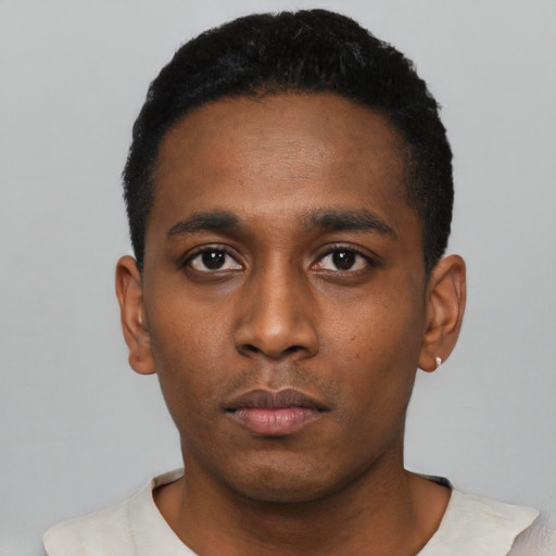 Neutral black young-adult male with short  black hair and brown eyes
