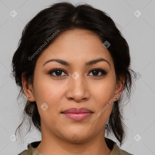 Joyful latino young-adult female with medium  brown hair and brown eyes