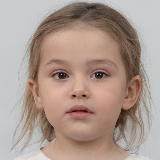 Neutral white child female with medium  brown hair and brown eyes