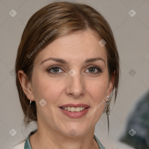 Joyful white adult female with medium  brown hair and grey eyes