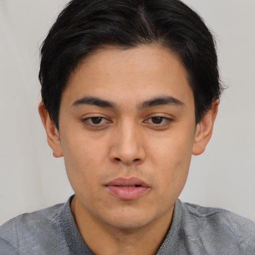 Neutral asian young-adult male with short  brown hair and brown eyes