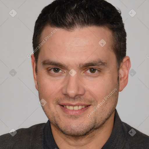 Joyful white adult male with short  brown hair and brown eyes