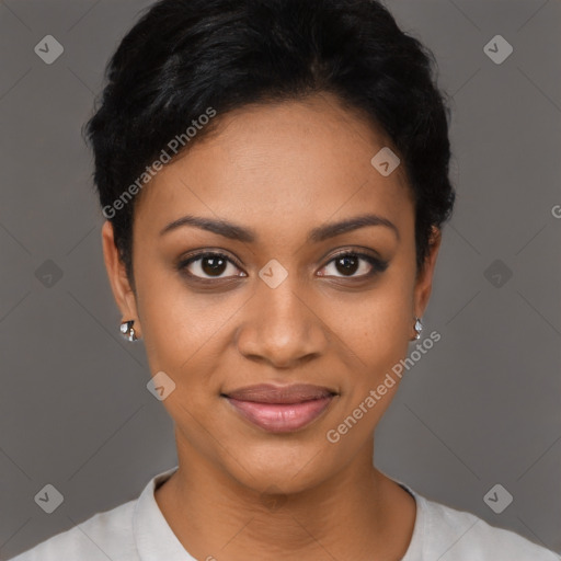 Joyful black young-adult female with short  black hair and brown eyes