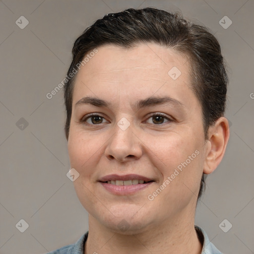 Joyful white adult female with short  brown hair and brown eyes